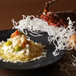 松輪産伊勢海老の濃厚ミルク炒め きたあかりと共に